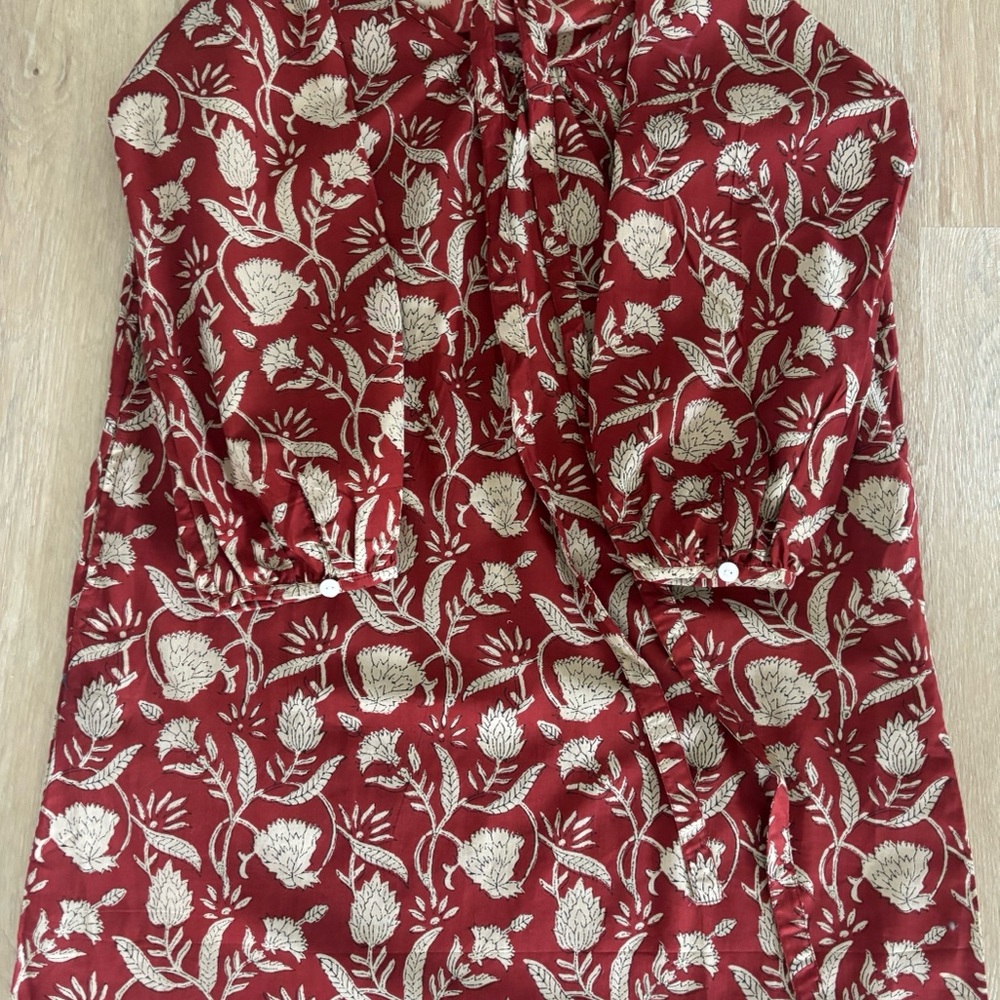 organic cotton dress. Tie belt. Block printed . Side pockets . Never worn